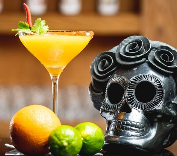 Meshico Restaurant Group Skull and Cocktail