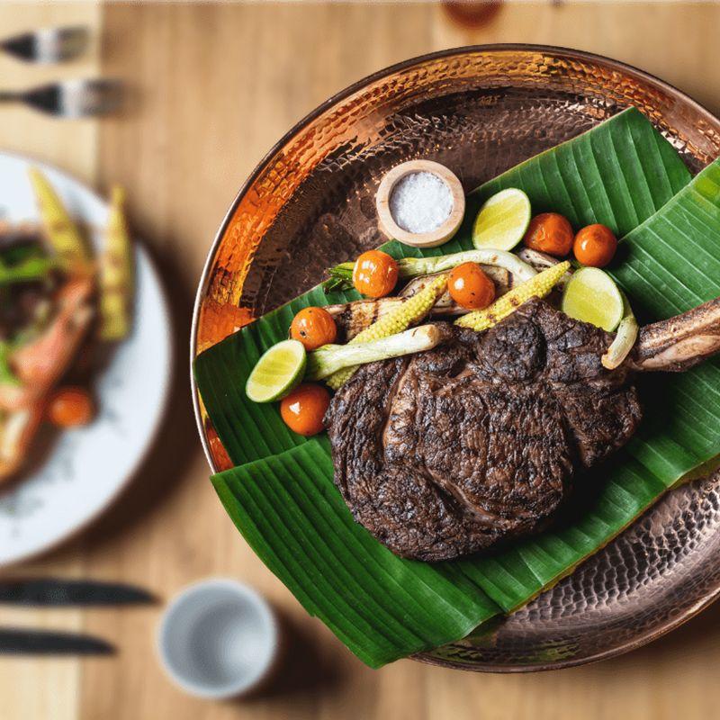 Meshico Restaurant Group steak and vegetables on a leaf
